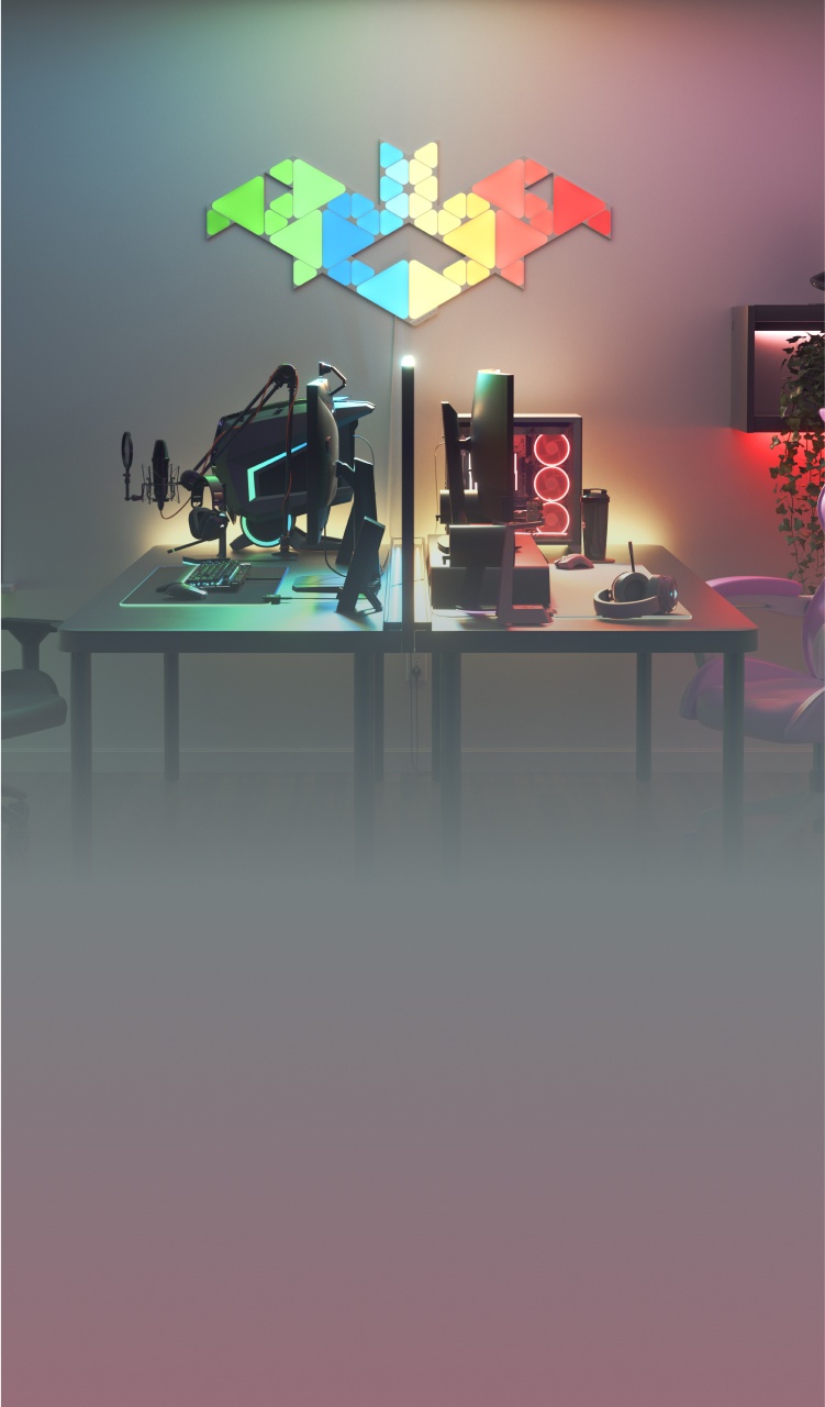 Office bedroom setup with Nanoleaf Lines RGB lights mounted above the desk and monitor. The perfect gaming lights for your PC battlestation.